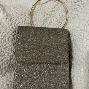Silver glitter evening clutch